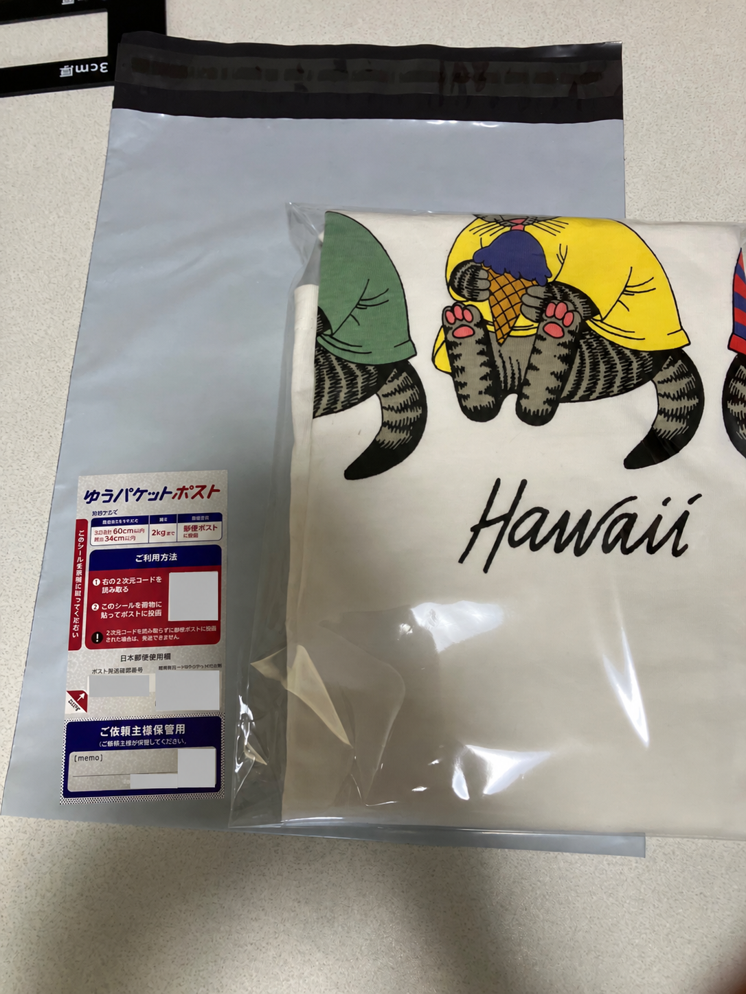 ハワイのTシャツと透明袋、配送用袋、ゆうパケットポスト発送用シール
